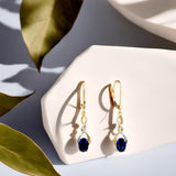 Lab Created Blue Sapphire Earrings in 14k Yellow Gold Plated Sterling Silver